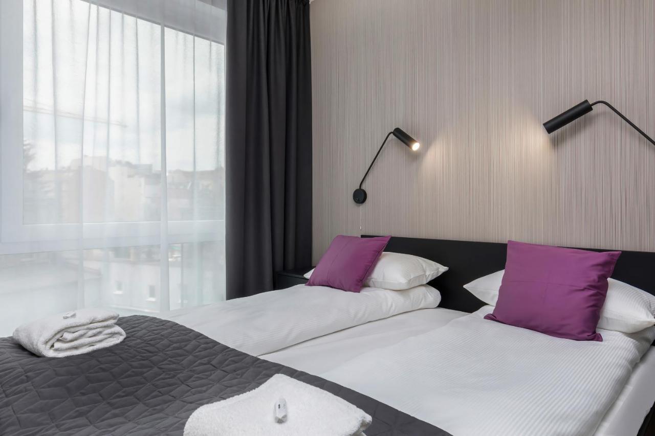Modern City Center Apartments By Noclegi Renters พอซนาน ภายนอก รูปภาพ